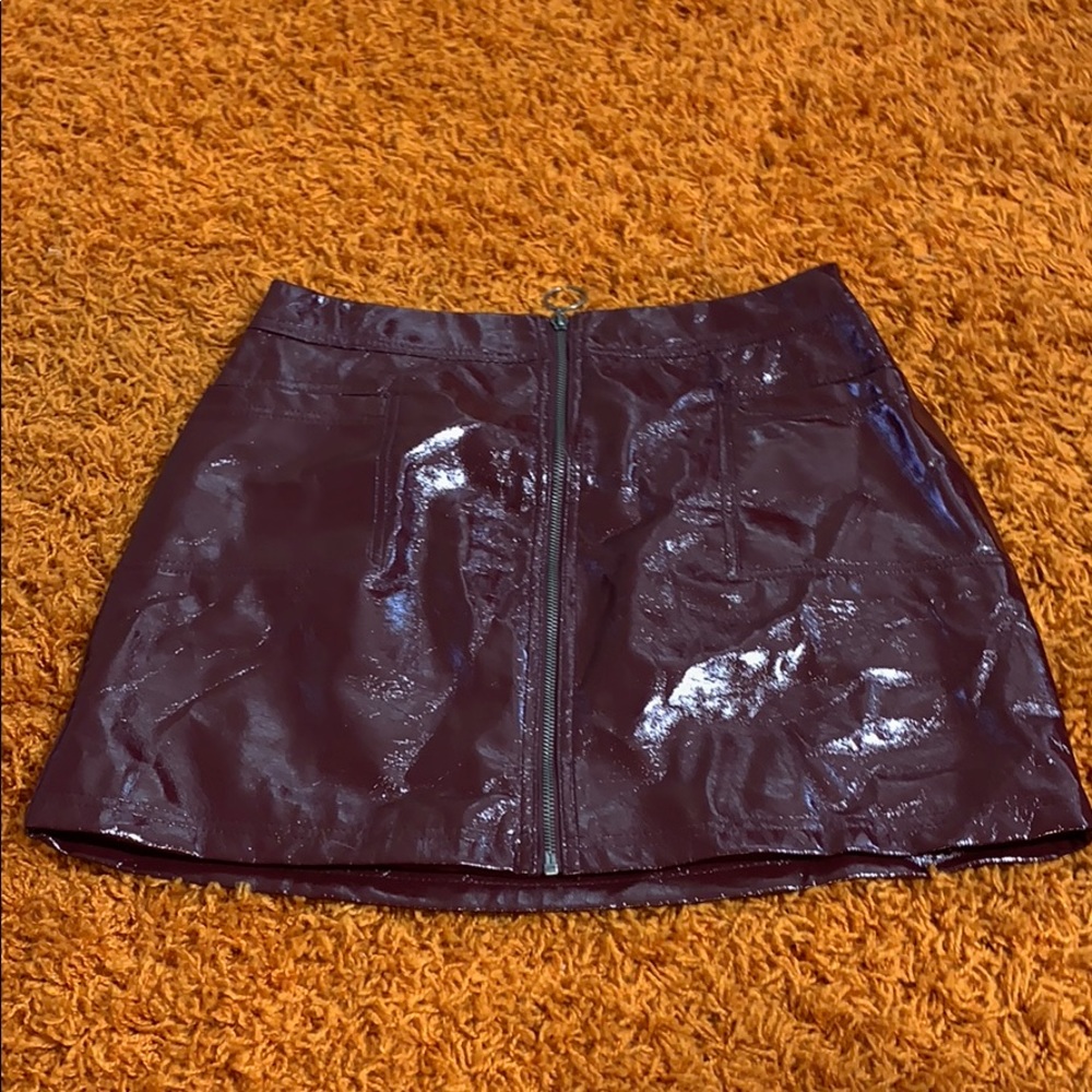 Burgundy faux leather zip-up skirt with pockets!